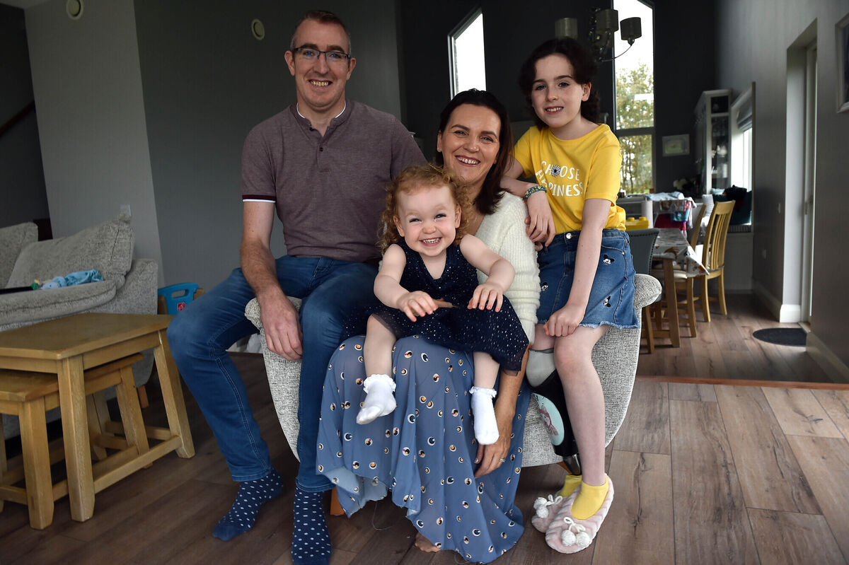 Roseanna and Ollie Ruane with their children Saoirse (9) and Farrah Rose (2) at their home near Loughrea, County Galway. Photo: Ray Ryan Roseanna and Ollie Ruane with their children Saoirse (9) and Farrah Rose (2) at their home near Loughrea, County Galway. Photo: Ray Ryan