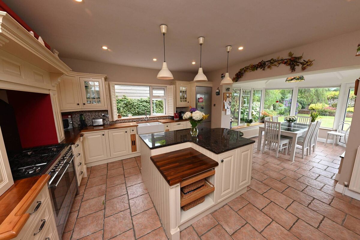 Kitchen links to sunroom