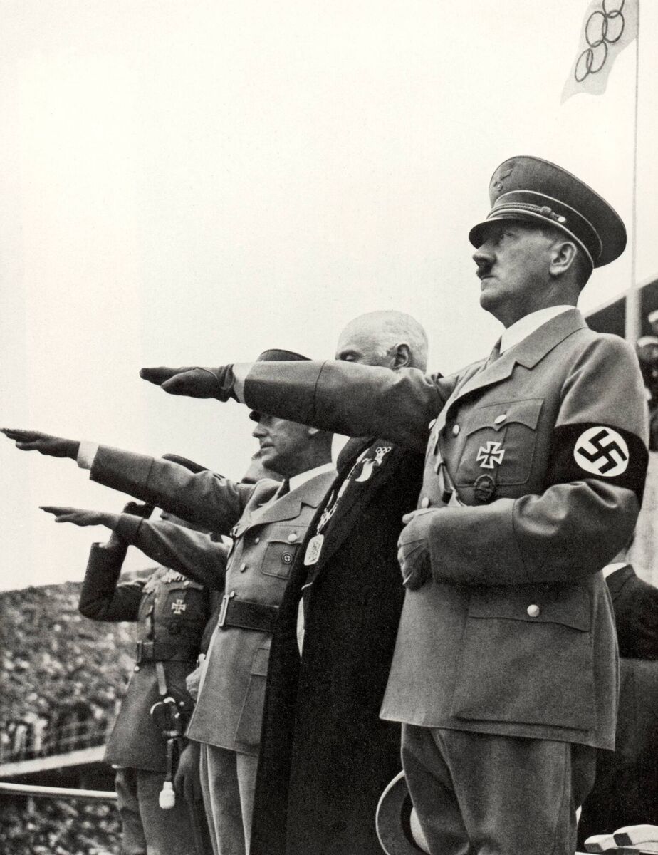Adolf Hitler and his staff salute the teams during the opening ceremonies of the XI Olympic Games on August 1, 1936 in Berlin, Germany. Picture: Getty Images