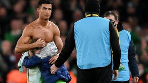 <p>Cristiano Ronaldo of Portugal gives his jersey to Republic of Ireland supporter, Addison Whelan, after the FIFA World Cup 2022 qualifying group A match between Republic of Ireland and Portugal at the Aviva Stadium in Dublin. Picture: Stephen McCarthy/Sportsfile</p>