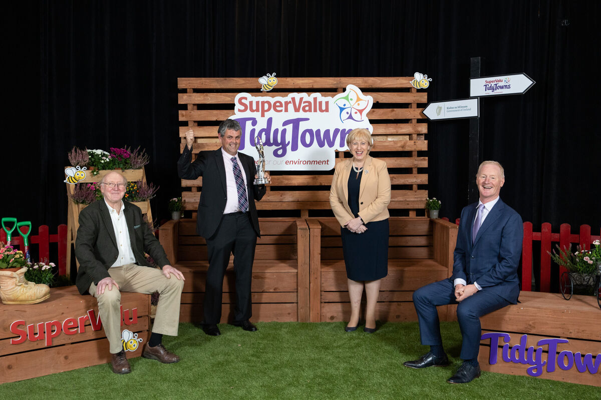 Colm Damery and Hendrick Verwey of Cobh Tidy Towns wth Minister for Rural and Community Development, Heather Humphreys TD and Ray Kelly, Marketing Director, SuperValu; who announced Cobh as the winner of Ireland's Tidest Large Town for 2021. Picture: Naoise Culhane Colm Damery and Hendrick Verwey of Cobh Tidy Towns wth Minister for Rural and Community Development, Heather Humphreys TD and Ray Kelly, Marketing Director, SuperValu; who announced Cobh as the winner of Ireland's Tidest Large Town for 2021. Picture: Naoise Culhane