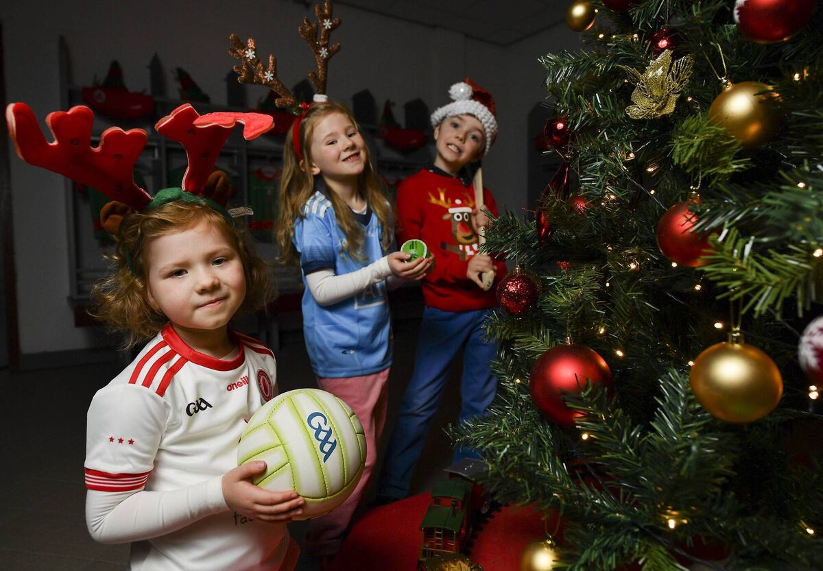 Lauren O' Brien, Katie May O'Brien, and Alexander Bellintani, during a Santa Experience at Croke Park in Dublin.