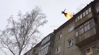 Amateur stuntman sets himself on fire and jumps off building