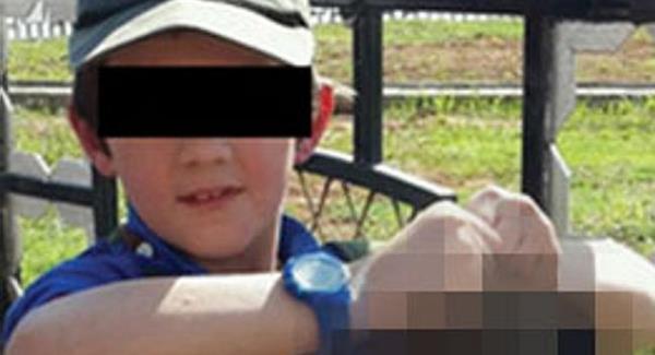 Granddad's fears for boy, 7, pictured holding severed head