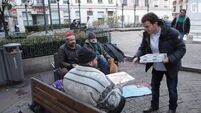 French man hands out pizzas to homeless for Christmas