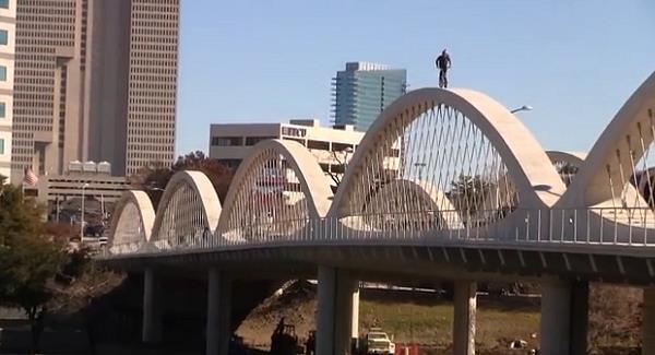 Watch this insane bike ride over the arches of a bridge