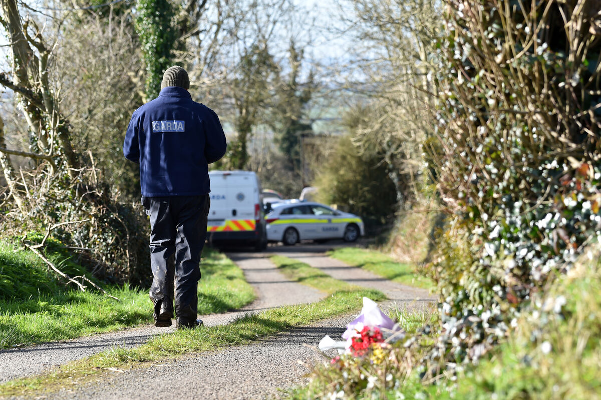  A member of the Garda search team at the Hennessy family farm at Curraghgorm near Mitchelstown, North Cork last February. Picture: Dan Linehan