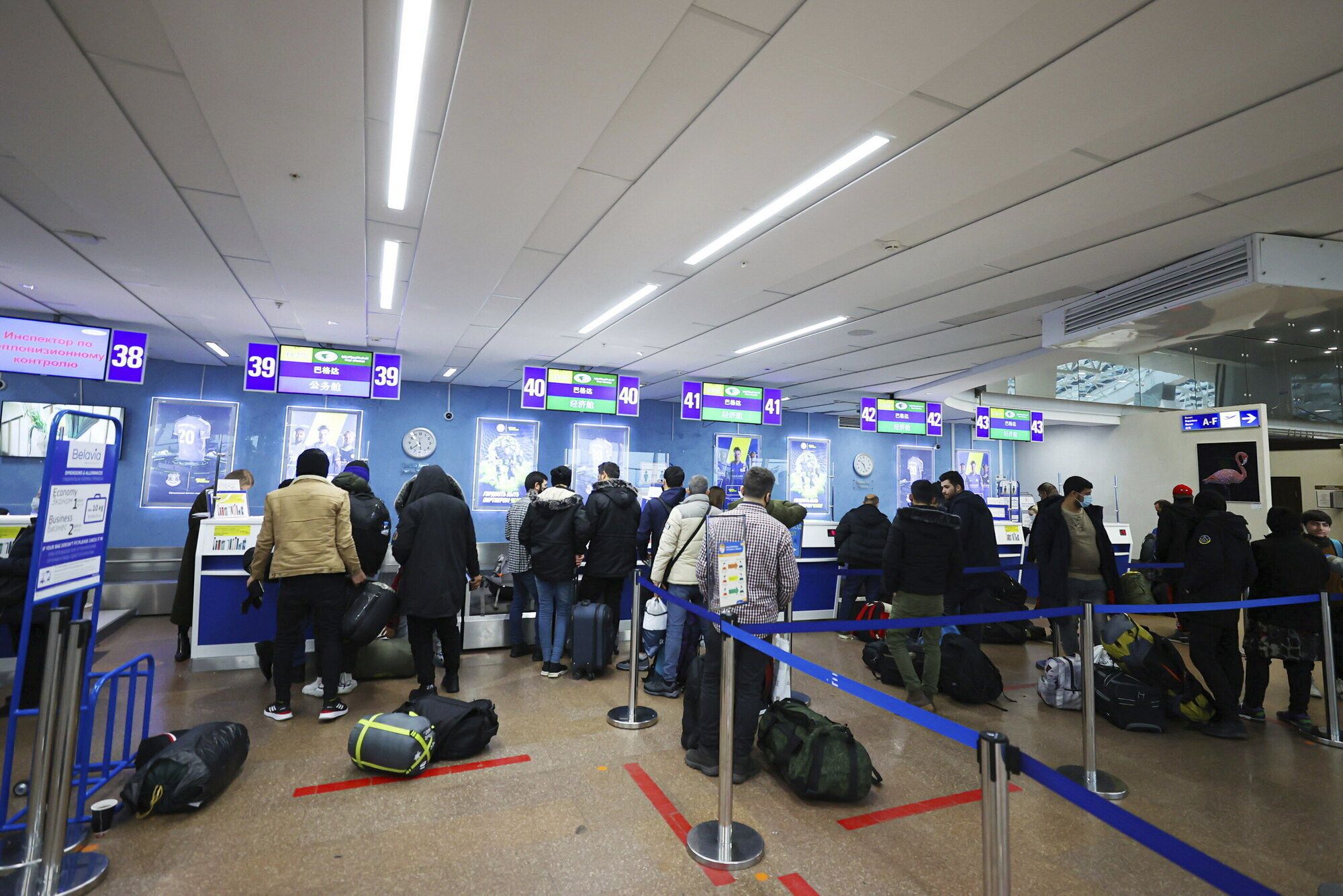 Hundreds of Iraqis fly home from Belarus after abandoning hope of reaching EU