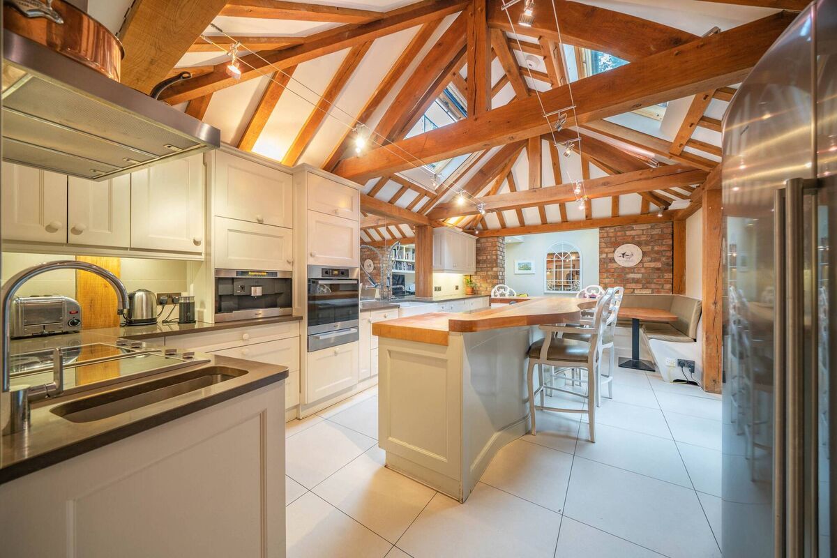 Kitchen extension with French oak beam framing Kitchen extension with French oak beam framing