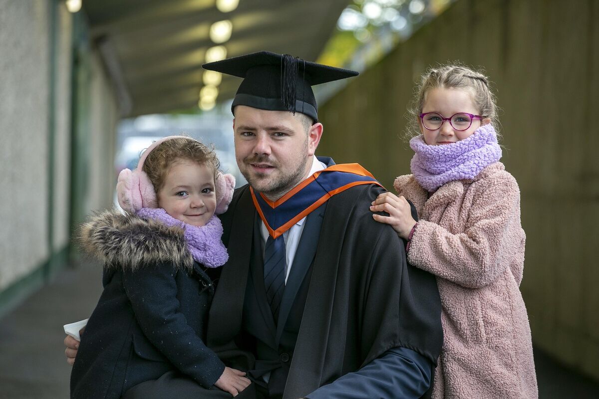 Ryan Moore of Caherdavin, Limerick with his daughters Indie (3) Kaia (6) at the technological university graduation ceremony. Picture: Arthur Ellis. Ryan Moore of Caherdavin, Limerick with his daughters Indie (3) Kaia (6) at the technological university graduation ceremony. Picture: Arthur Ellis.
