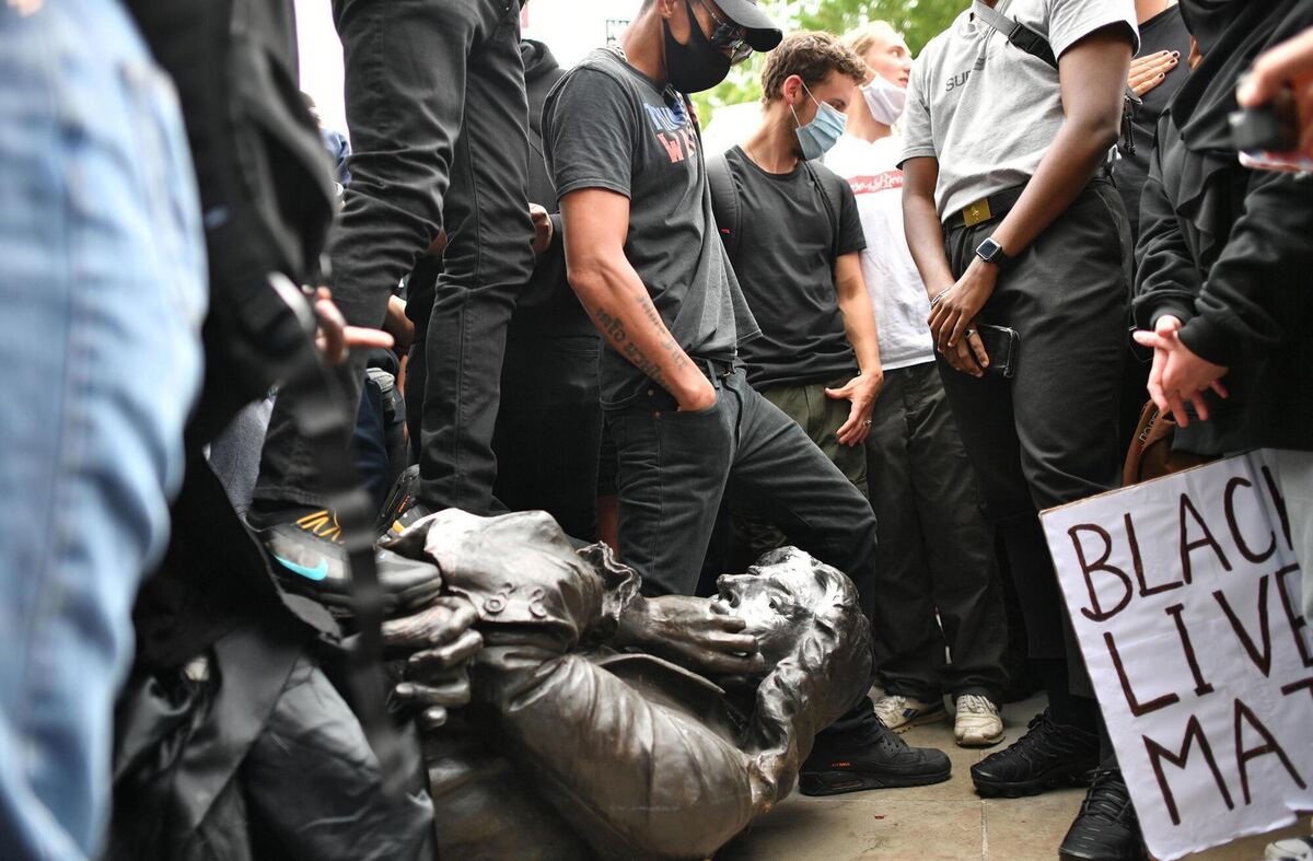 Protesters pull down a statue of Edward Colston during a Black Lives Matter protest rally in College Green, Bristol. Picture (June 7, 2020): Ben Birchall/PA Wire