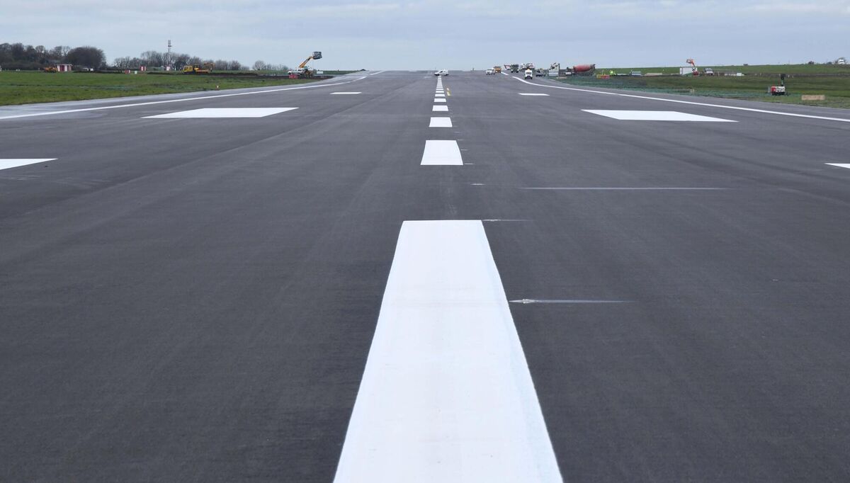 The main runway at Cork Airport where the finishing touches have been put in place ahead of reopening for flights on Monday at 0200 hours. Picture: Denis Minihane