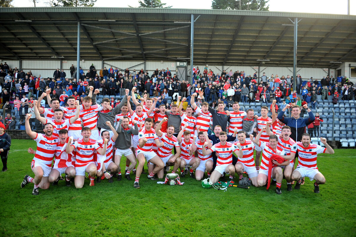  Ballygiblin full-back Fionn Herlihy (captain) and team celebrate with the cup after their win in the Co-Op Superstores Cork JAHC final. Pic: Larry Cummins