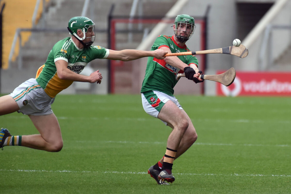 Fr O'Neills Daniel Harrington shoots from Bride Rovers' Paddy O'Flynn. Picture: Eddie O'Hare
