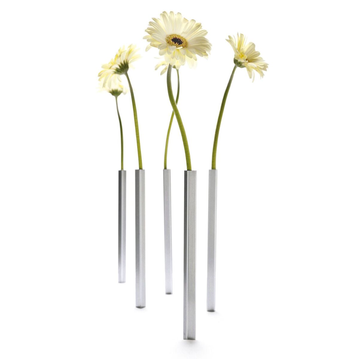 Peleg's magnetic set of four slender bud vases, float on the table secured with a base secreted under the tabletop, €40.54, propogandashop.eu. Peleg's magnetic set of four slender bud vases, float on the table secured with a base secreted under the tabletop, €40.54, propogandashop.eu.