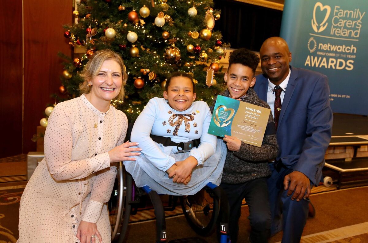 Clare Sydney, Munster Carer of the Year, with her partner Darum Sydney and twin children Isabella and A.J. (12) at today's awards ceremony. Photo: Mark Stedman Clare Sydney, Munster Carer of the Year, with her partner Darum Sydney and twin children Isabella and A.J. (12) at today's awards ceremony. Photo: Mark Stedman