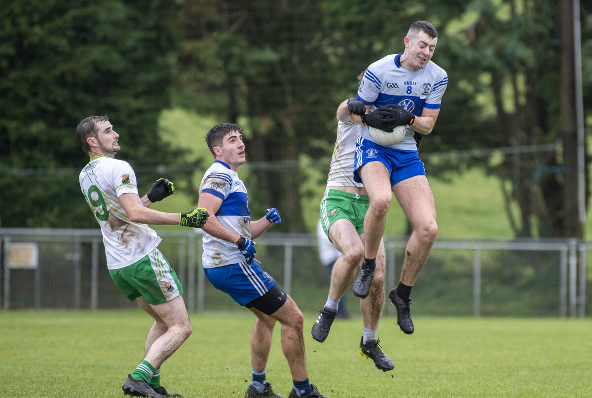 Adam Donoghue, Castleisland Desmonds and Tommy Kennelly Ballydonoghue in action during the game. Picture: Domnick Walsh