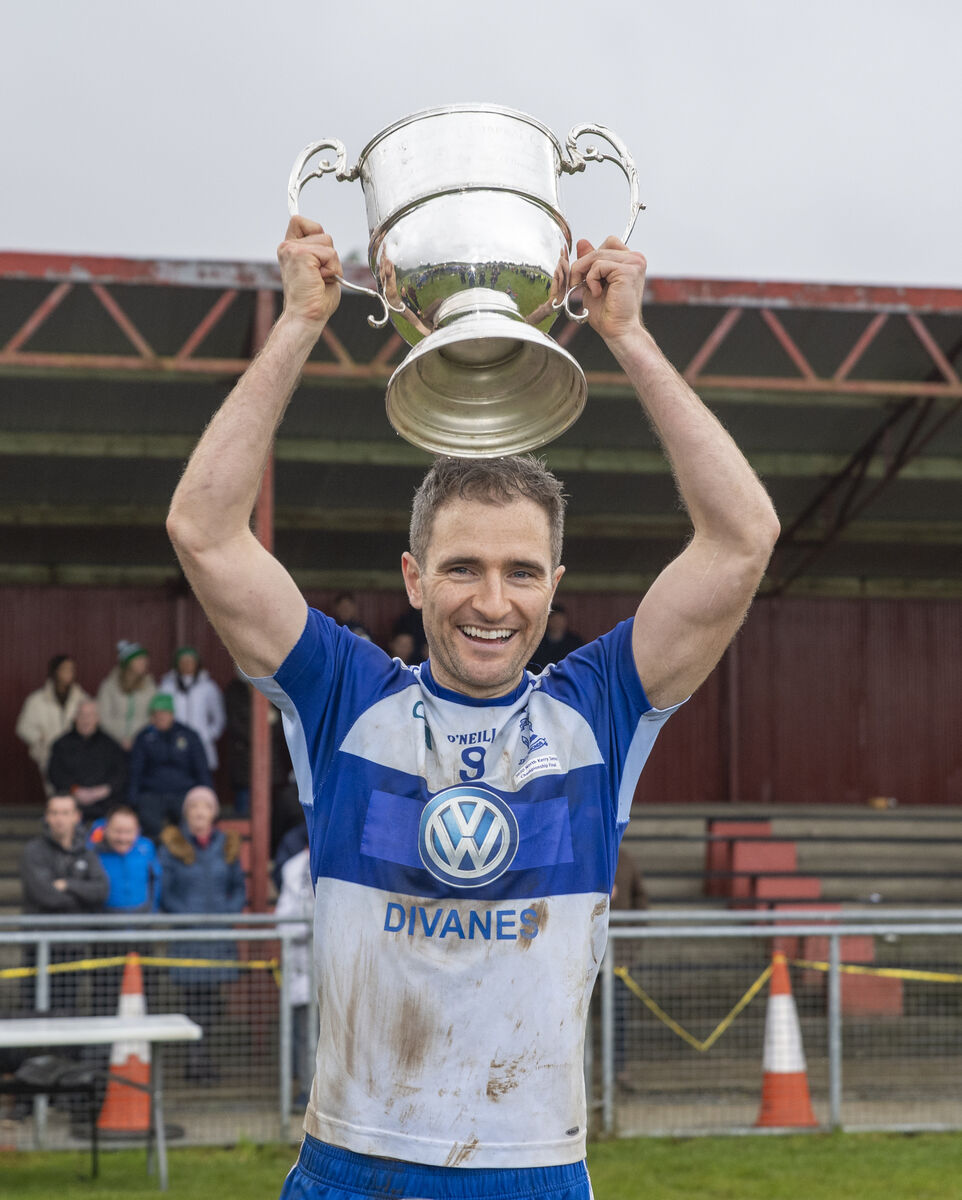 Maurice Hickey captain of Castleisland Desmonds with the cup after his team won the game. Picture: Domnick Walsh