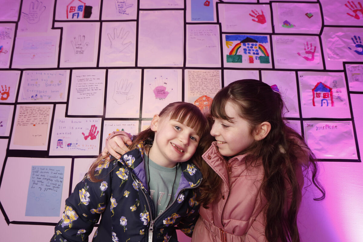 Kimberley, 10, and Kayleigh, 5, daughters of Kelly-Anne Byrne, lived experience ambassador for Focus Ireland, at the launch of the ‘A Home For Christmas’ exhibition on Wicklow St Dublin. Picture: Leon Farrell / Photocall Ireland