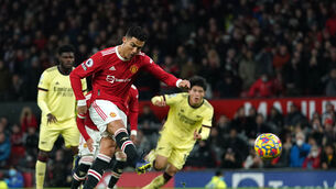 <p>Manchester United's Cristiano Ronaldo scores their side's third goal of the game from a penalty during the Premier League match at Old Trafford, Manchester. Picture  Martin Rickett/PA Wire. </p>