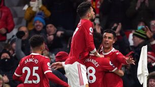 <p>Cristiano Ronaldo, right, netted a brace as Manchester United beat Arsenal (Martin Rickett/PA)</p>