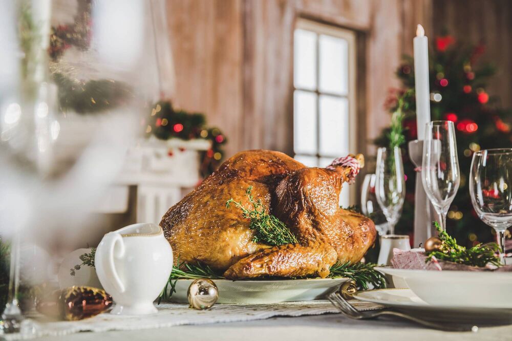Traditional Christmas turkey with fresh herb stuffing and gravy