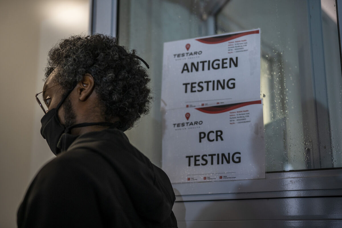 A person queues to be tested for Covid-19 in Johannesburg, South Africa, on Saturday. As the world grapples with the emergence of the Omicron variant, scientists in South Africa — where omicron was first identified — are scrambling to combat its spread across the country. Picture: Jerome Delay/AP A person queues to be tested for Covid-19 in Johannesburg, South Africa, on Saturday. As the world grapples with the emergence of the Omicron variant, scientists in South Africa — where omicron was first identified — are scrambling to combat its spread across the country. Picture: Jerome Delay/AP