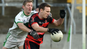 <p>Newmarket's Barry O'Connor is tackled by Kanturk's Lorcan McLoughlin during the Bon Secours Cork PIFC final at Pairc Ui Chaoimh. Picture: Eddie O'Hare</p>