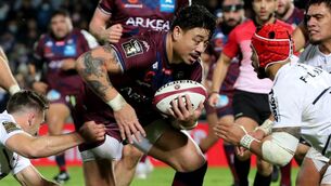 <p>Bordeaux-Begles' New Zealand wing Ben Lam challenges (C) challenges Toulouse's New Zealand centre Pita Ahki during the French Top14 rugby union match between Union Bordeaux-Begles (UBB) and Stade Toulousain at the Chaban-Delmas stadium in Bordeaux, southwestern France, on December 4, 2021.  Photo by ROMAIN PERROCHEAU/AFP via Getty Images)</p>