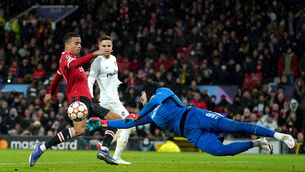 <p>Young Boys' Goalkeeper Guillaume Faivre saves a shot from Manchester United's Mason Greenwood</p>
