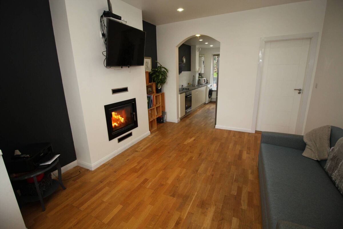 Arch links living room and kitchen