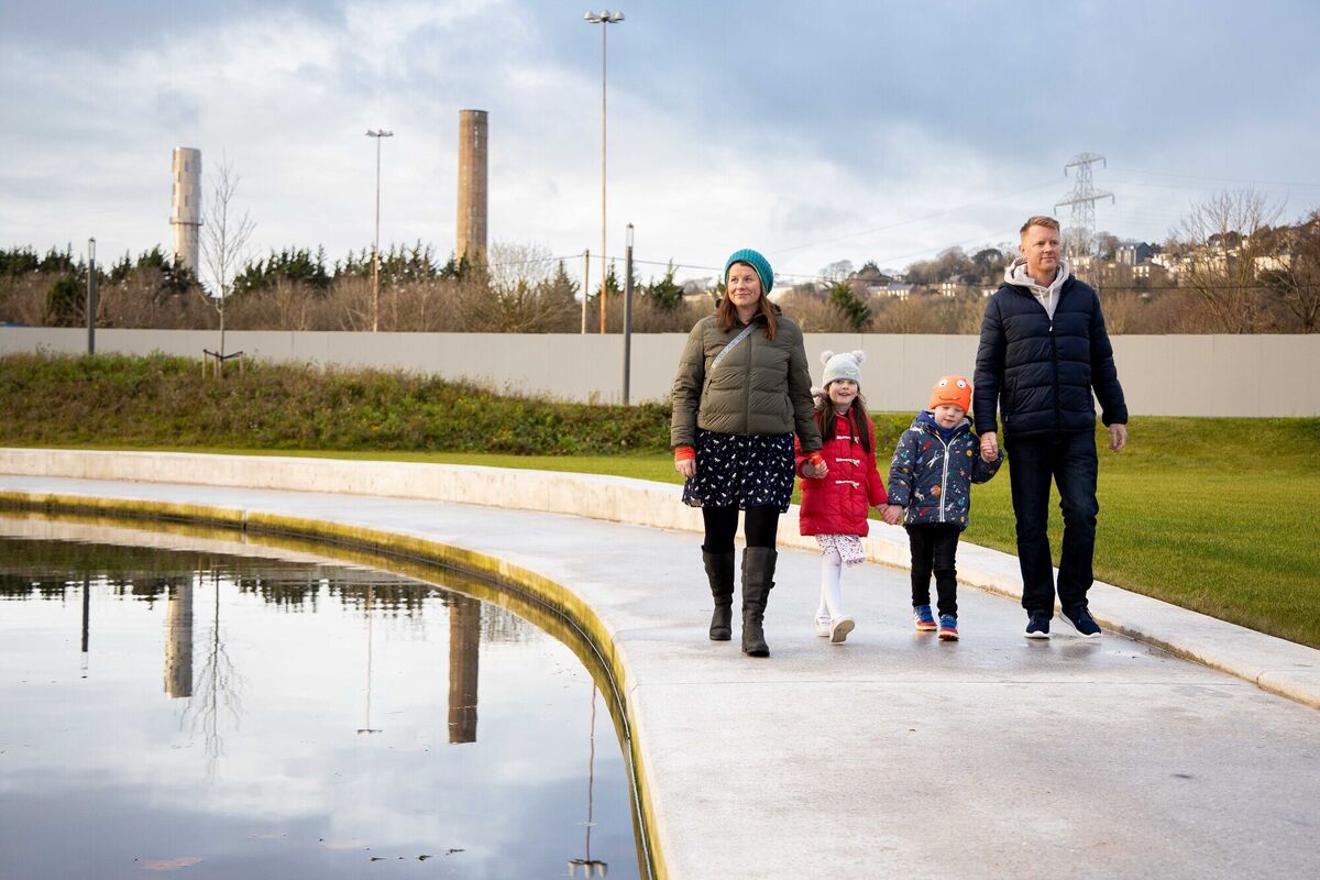 Grace and Ruairi O'Flynn with parents Caroline and Brian, have run-around in Cork's newest park where Cork City Council workers were making last-minute preparations before the park's opening to the public on Monday. Picture: Michael O'Sullivan /OSM PHOTO