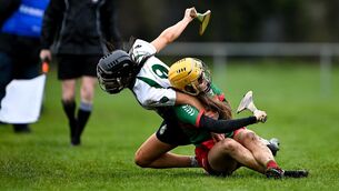 <p>11 December 2021; Mary Burke of Drom and Inch and Niamh McGrath of Sarsfields tussle off the ball during the 2020 AIB All-Ireland Senior Club Camogie Championship Semi-Final match between Sarsfields and Drom and Inch at Edenderry GAA club in Edenderry, Offaly. Photo by Piaras Ó Mídheach/Sportsfile</p>