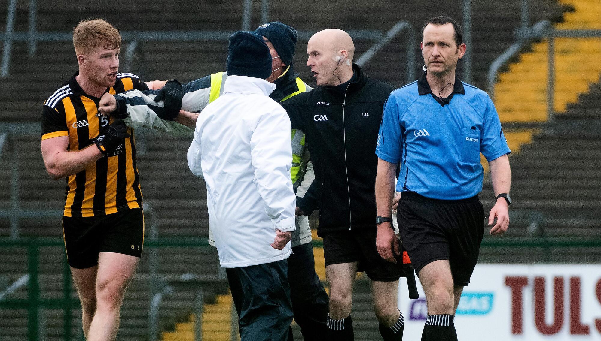 Mountbellew-Moylough's players argue with with referee Jerome Henry