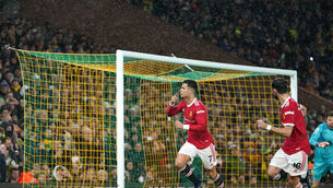 <p>Manchester United's Cristiano Ronaldo (left) celebrates scoring their side's first goal of the game during the Premier League match at Carrow Road, Norwich. Picture: Joe Giddens/PA Wire </p>