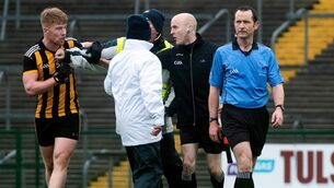 <p>Mountbellew-Moylough's players argue with with referee Jerome Henry</p>