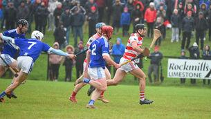 <p> Colin English, Ballygiblin has a shot on goal stopped by Caherline. Picture: Larry Cummins.</p>