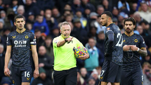 <p>Referee Jon Moss (second left) awards a penalty to Manchester City during the Premier League match at the Etihad Stadium. Picture: Richard Sellers</p>