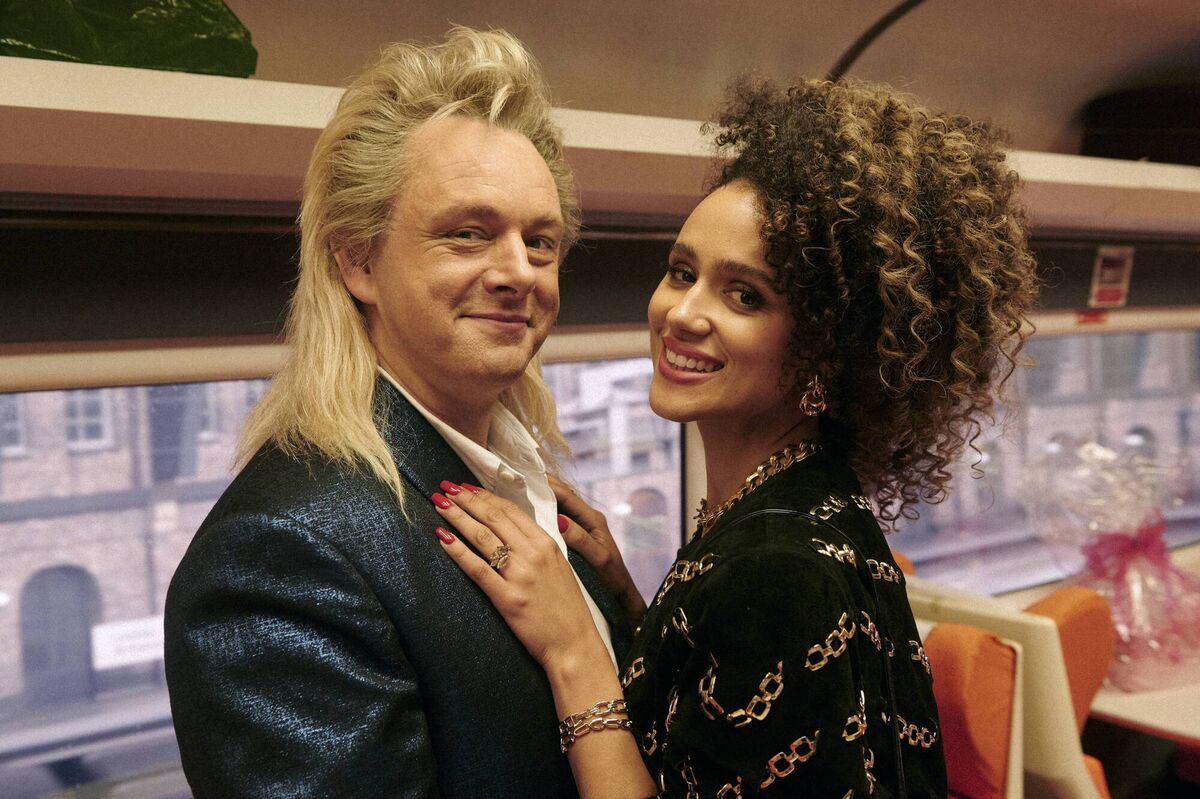 Last Train to Christmas: Michael Sheen as Tony and Nathalie Emmanuel as Sue. Picture: PA Photo/AOT Film Limited/Rob Baker Ashton