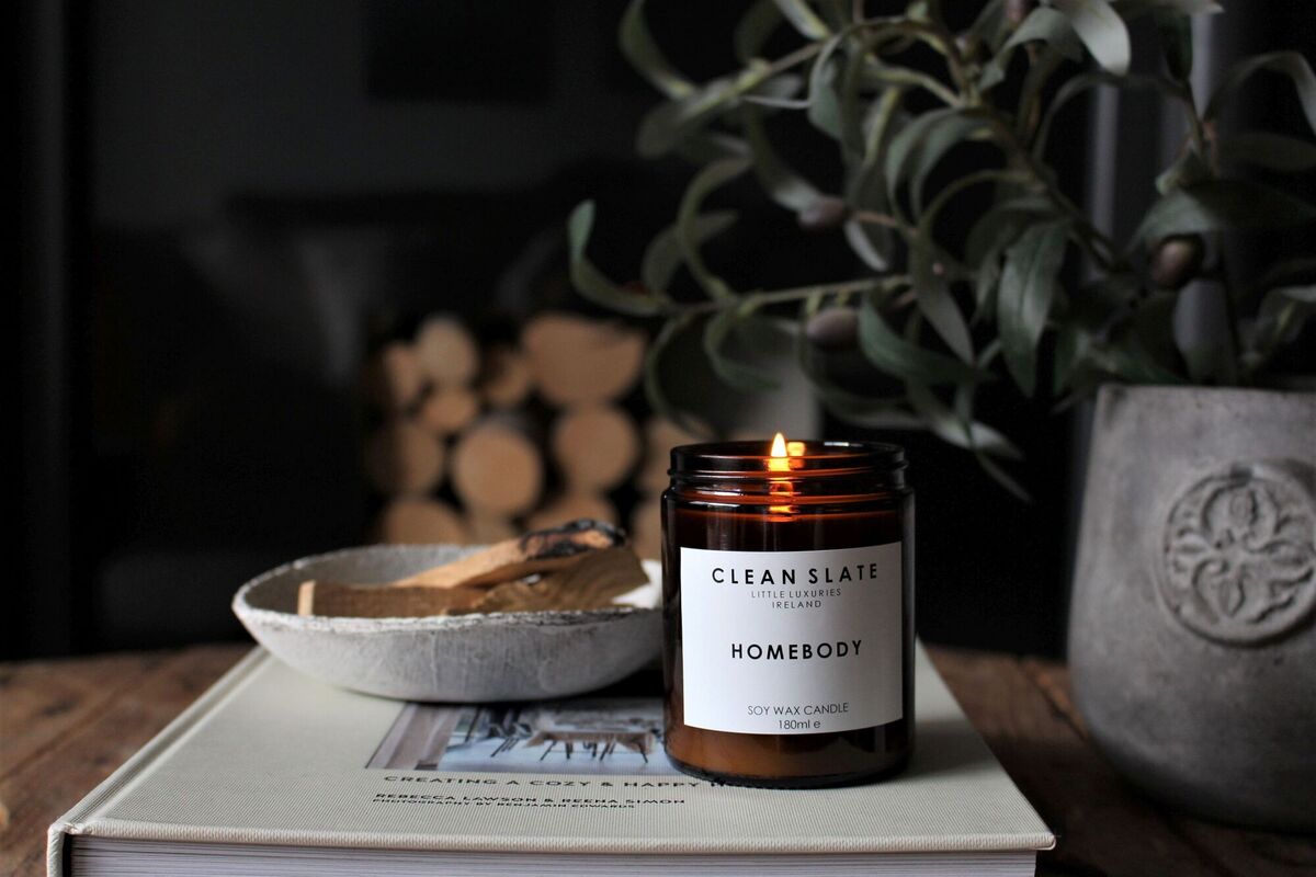 Clean Slate's scented candle collection includes Homebody, a fragrance with notes of pine and lemon (€20). Clean Slate's scented candle collection includes Homebody, a fragrance with notes of pine and lemon (€20).