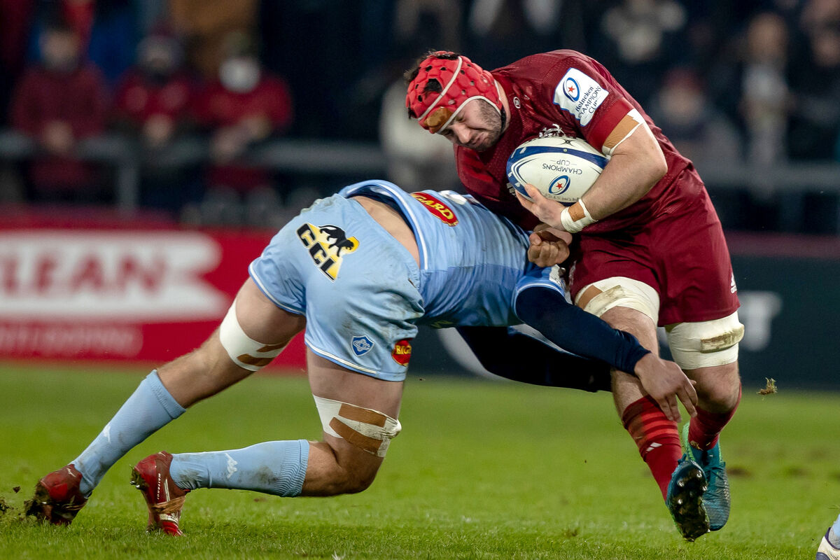 ELUSIVE: Munster’s John Hodnett with Kevin Kornath of Castres Olympique