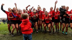 <p>Oulart The Ballagh’s Mary Leacy’s son Jake celebrates with the team after their All Ireland club championship win over Sarsfields in Nowlan Park on Saturday</p>