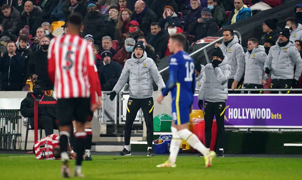 Chelsea manager Thomas Tuchel (centre) gestures towards Ross Barkley