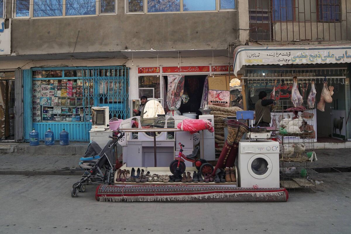  Markets in Kabul are full of families selling household items to put food on their tables.