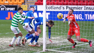 <p>Celtic's Liel Abada (left) scores their side's first goal of the game during the Scottish Premiership match at McDiarmid Stadium, Perth. Picture: Andrew Milligan/PA</p>