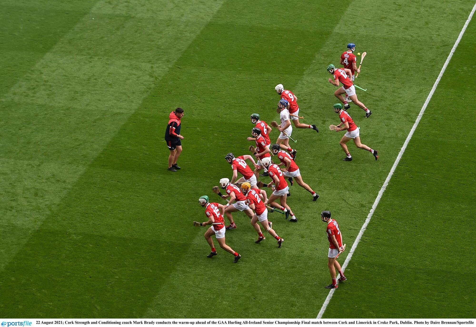 
                Cork S&C coach Mark Brady conducts the warm-up ahead of the All-Ireland SHC final against Limerick in Croke Park in August. Picture: Daire Brennan/Sportsfile
            