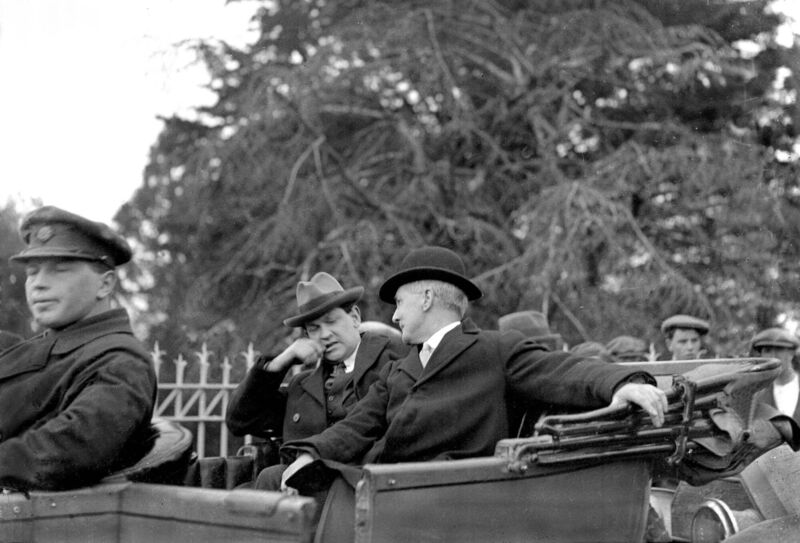 Michael Collins (centre) said the opposition’s only policy is one intended “to stir up trouble” and “their desire evidently is by any trickery to deny the expression of the people’s will in an election.” Michael Collins (centre) said the opposition’s only policy is one intended “to stir up trouble” and “their desire evidently is by any trickery to deny the expression of the people’s will in an election.”