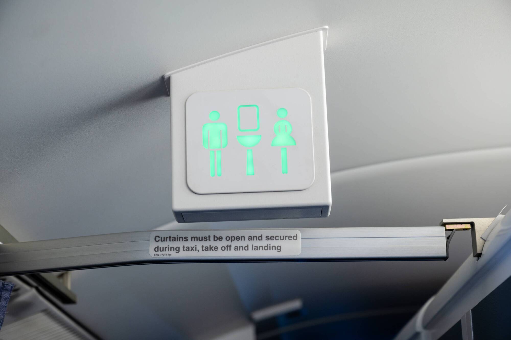 Woman self-isolates in plane toilet for five hours after Covid-positive test mid-flight