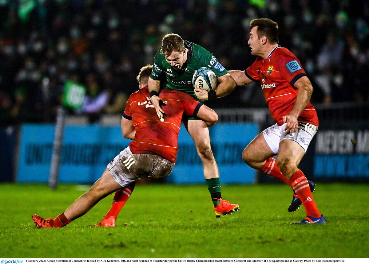 Kieran Marmion of Connacht is tackled by Alex Kendellen, left, and Niall Scannell of Munster during the United Rugby Championship match between Connacht and Munster at The Sportsground in Galway. Photo by Eóin Noonan/Sportsfile