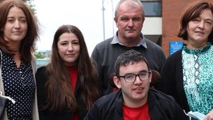 <p>Keith Phelan with his sisters, Kelly and Lyndsey, and parents Tony and Margaret, after he settled his High Court action in July 2021 for €11m. Families are forced to go through a long legal battle to get access to justice, according to solicitor Lyndy Cantillon. Picture: Collins Courts</p>